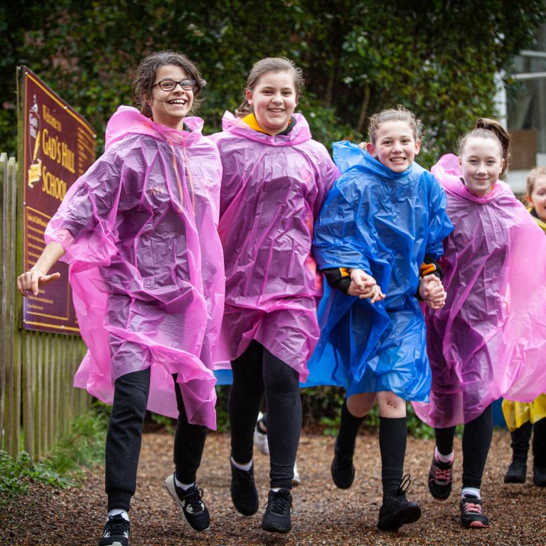 children in raincoats
