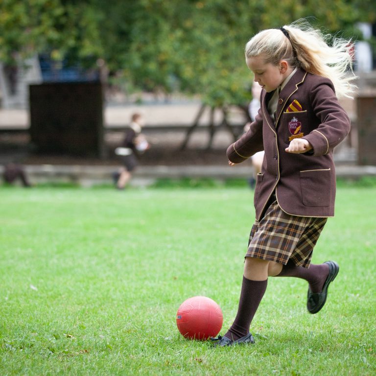 girl playing with a ball